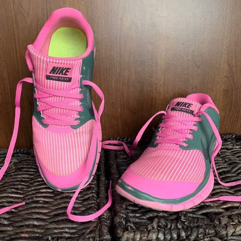 Pink Nike Free Runners 4.0 size: 9W